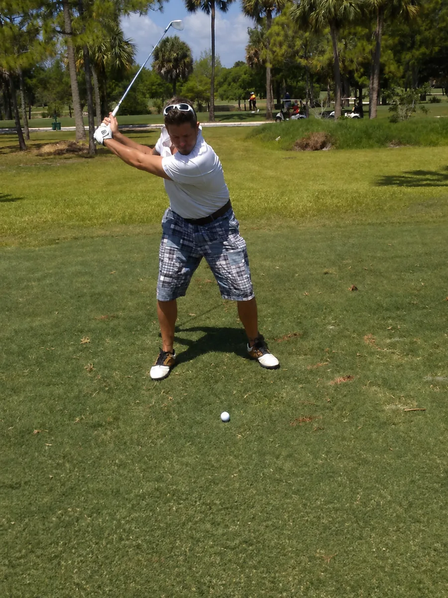 Brian Vulbrock preparing to swing a golf club